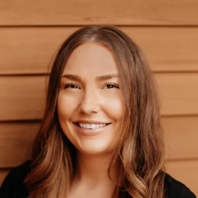 A headshot photo of Angela, the office manager at Alta Dental of Maine