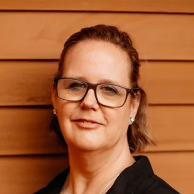 A headshot photo of Debbie, a patient care coordinator at Alta Dental of Maine
