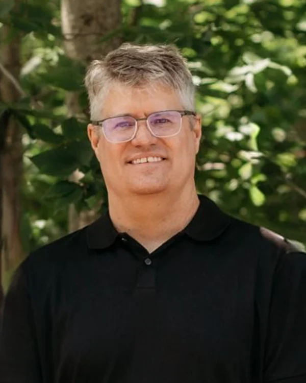 A photo of Dr. Joseph Wetherhold standing outside